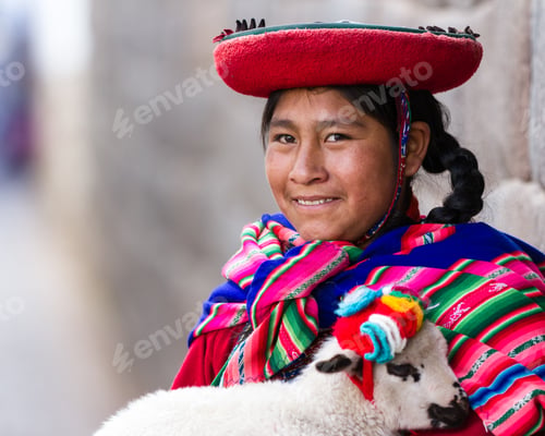 Preview: Cusco, Peru - May 14 : Jenni, A Young Woman Dressed In Colorful Traditional Native Peruvian Closing