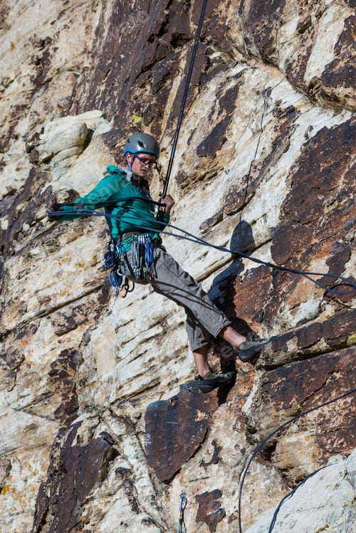 Preview: Young Man Repelling Down A Sandstone Cliff In Youth Western Utah