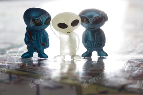 Preview: Alien Figures with Large Eyes on Surface