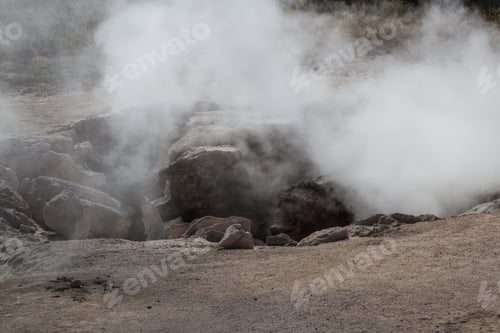 Preview: Steaming Rocks In Yellowstone National Park Back Lit By The Sun