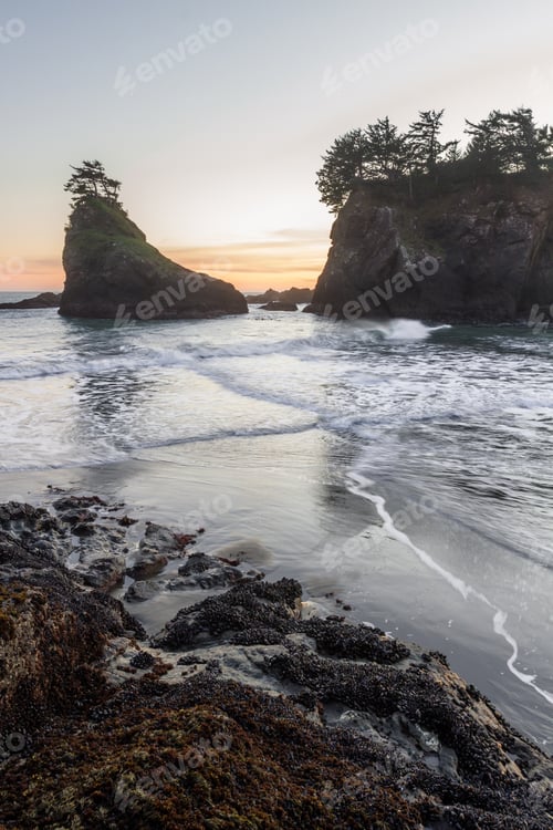 Preview: The Sun Sets On Secret Beach In The Southern Oregon Coast At Sunset With Its Many Islets Topped