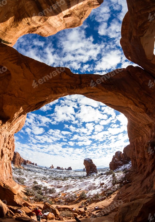 Preview: Moab, Utah - December 03: Tourists Exploring The Inside Of Double Arch, Photographed With A Fisheye