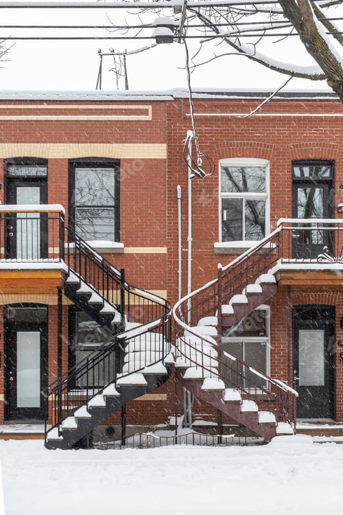 Aperçu: Montreal'S Unique Twisted Staircases Covered In A Fresh Layer Of Snow After A Snowstorm In