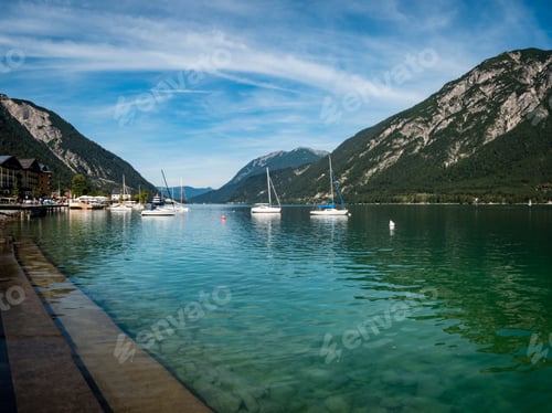 Preview: A View Of Lake Achensee In The Austrian Tyrol Region Of The Alps In Europe Showing Crystal Blue