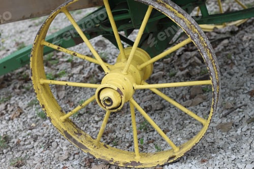 Preview: A Closeup Of A Round Yellow Wagon Wheel And Spokes. 2804