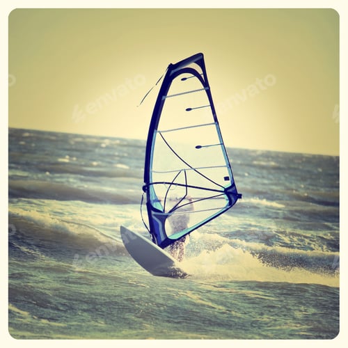 Preview: Lone Anonymous Windsurfer In The Ocean Catching A Wave With Instagram Effect Filter
