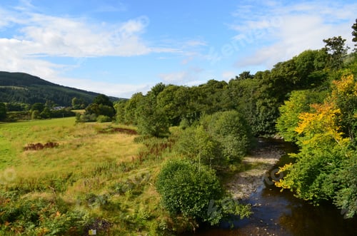 Preview: Gorgeous Countryside With Rolling Hills And A Winding Stream In Scotland.