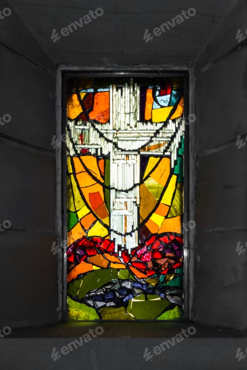 Preview: Culross, Scotland - September 16 2019: Stained Glass Window With A Cross In The Monument Room