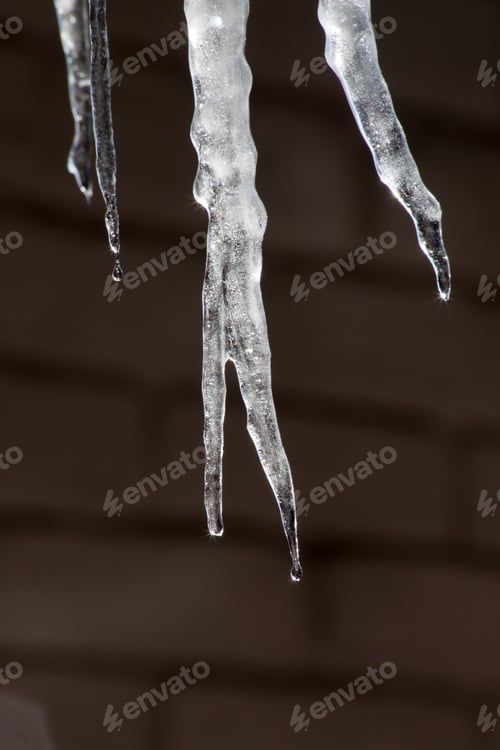 Preview: Icicle Against A Black Background