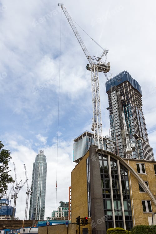 Preview: London - September 06 2019: Construction Cranes Busy At Work Erecting Tall Buildings Around The