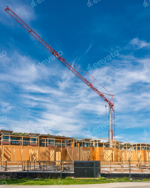 Preview: The Site With Cranes Against Blue Sky