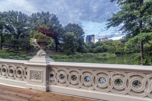 Preview: The Bow Bridge Is A Cast Iron Bridge Located In Central Park, New York City, Crossing Over The Lake
