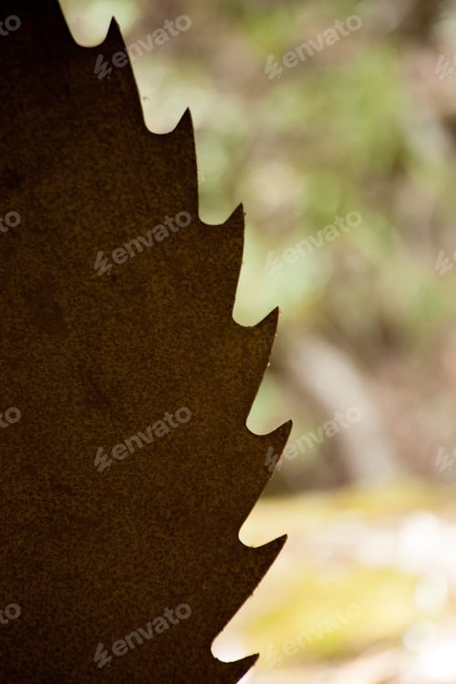 Preview: Saw Blade In Silhouette With Green Background