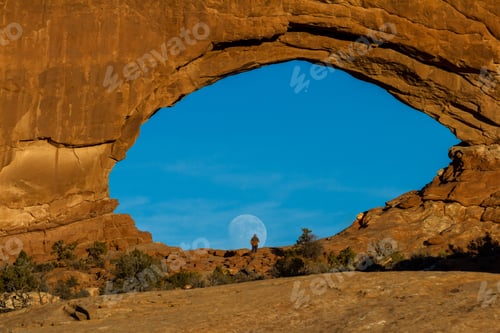 Preview: Beautiful View Of The Full Moon Rising Thru North Window In Arches National Park