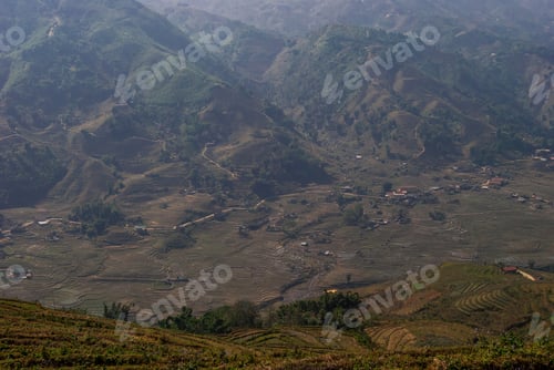 Preview: Rice Fields Terraces With Beautiful Mountains In The Background. Village At The Bottom Of The