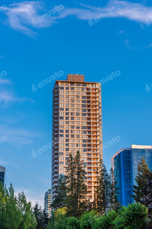Preview: The Top Of Apartment Building With Nice Windows And Blue Skay