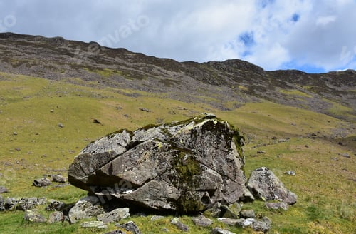 Preview: Large Bedrock Boulder On The Side Of A Mountain.