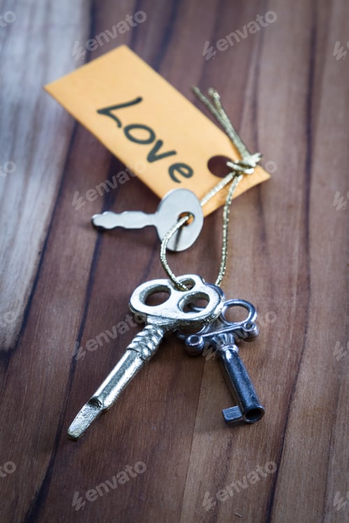 Preview: Concept For A Happy Loving Life Using Old Decorative Keys And A Hand Written Tag Attached By A