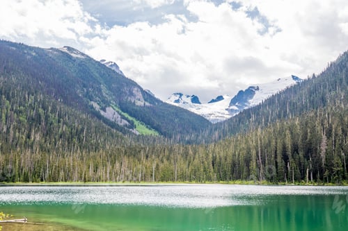 Preview: View At Mountain Lake With Dramatic Clouds In British Columbia, Canada.