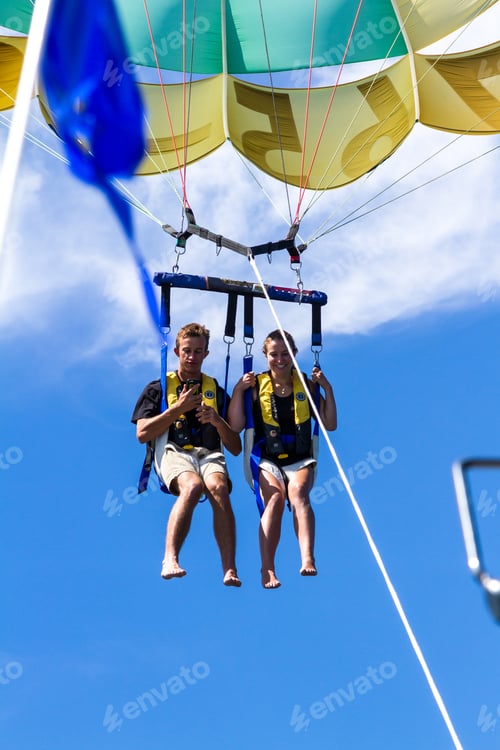 Preview: Coeur D' Alene, Idaho - August 12: Parasailing Adventure With People Enjoying The View. August 12