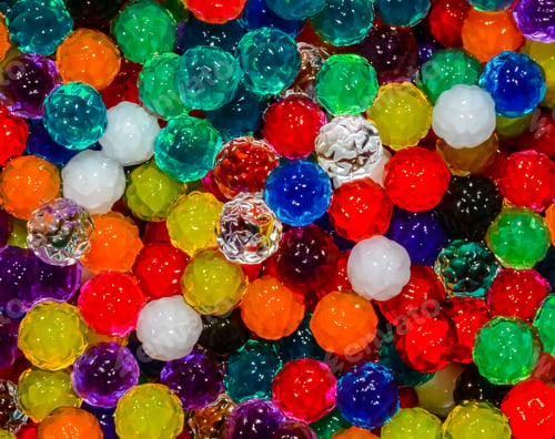 Preview: Multicolored Background Of Tiny Textured Beads.