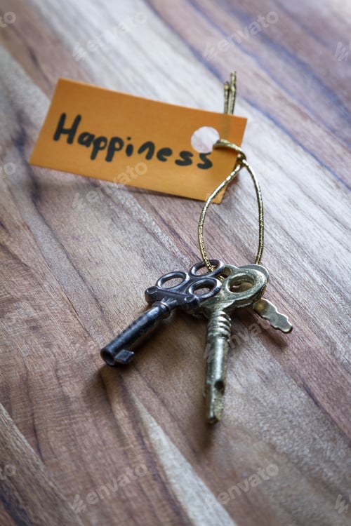 Preview: Concept For A Happy Life Using An Old Decorative Key And A Hand Written Tag Attached By A Golden