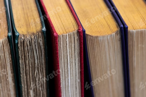 Preview: Row Of Old Books With Gilded Edge Pages Selective Focus