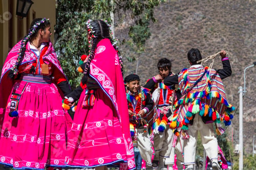 Preview: Ollantaytambo, Peru - May 16 : Religious Celebration For Fiestas De Pentecostes With People Wearing