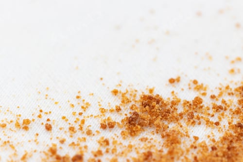 Preview: Selective Focus Brown Sugar Scattered On A Clean White Cloth Baking Concept With Copy Space