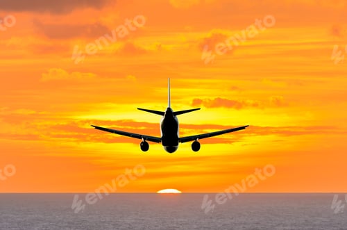 Preview: Sunset Or Sunrise (Dawn, Dusk ) Flight Of The Airplane (Jet) Over Beautiful Sky And Ocean.