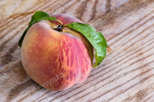 Preview: Close Up Of A Freshly Picked Peach On And Old Wooden Table