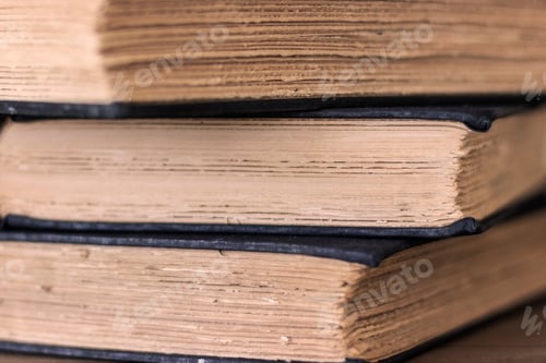 Preview: Stack Of Old Books With Rough Cut Deckle Edge Pages Selective Focus