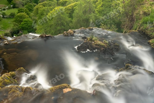 Preview: Smooth Blurred Motion Stream Falls Into Valley From The Top Of The Pistyll Rhaeadr Waterfall In