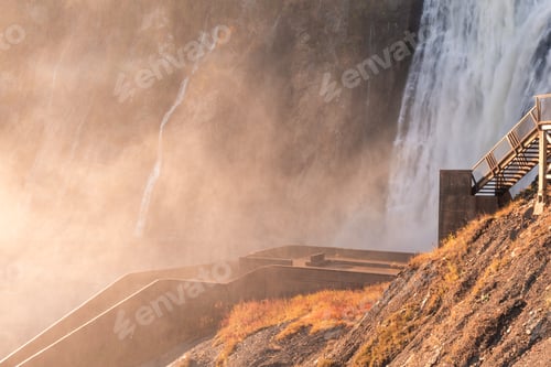 Preview: Sunset Light Through The Mist At The Bottom Of The Beautiful Montmorency Falls Near Quebec City.