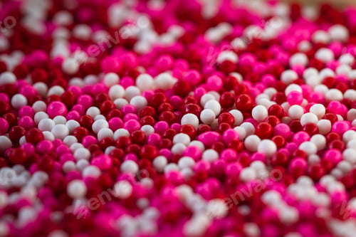 Preview: Macro Of A Group Of Small Edible Sugar Sprinkles In Different Hades Of Reds And White A Valentines