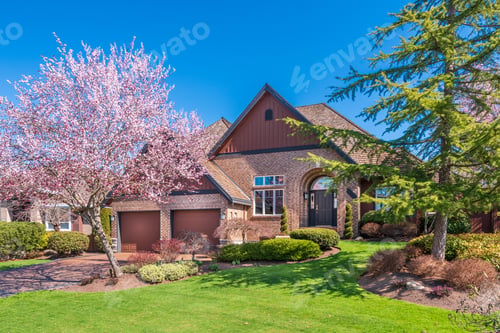 Preview: Beautiful Exterior Of Newly Built Luxury Home. Yard With Green Grass And Walkway Lead To Front