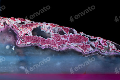 Preview: Macro Of A Beautiful Pink Stone Cut And Polished With An Interesting Pattern