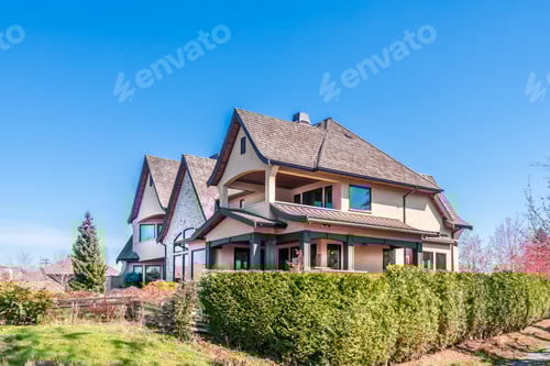 Preview: Beautiful Exterior Of Newly Built Luxury Home. Yard With Green Grass And Walkway Lead To Front