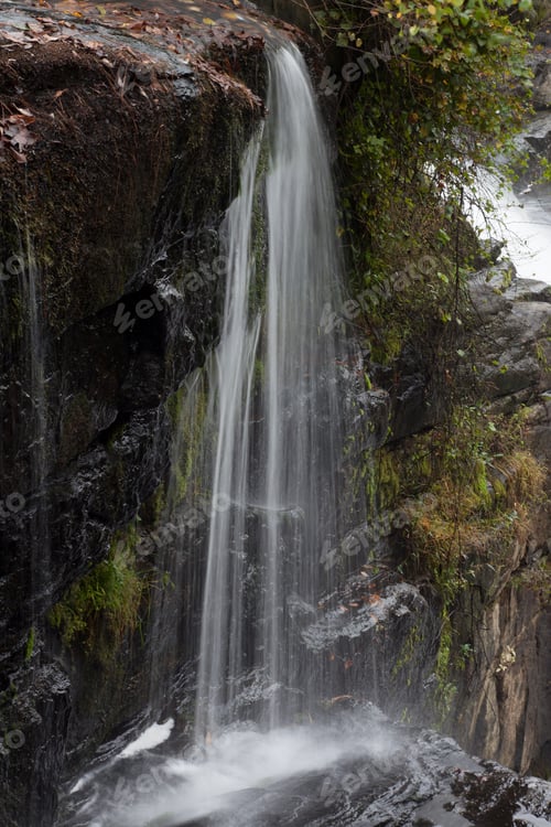 Preview: Mountain Waterfall, Cascading By Rocks, A Relaxing Place For Travelers