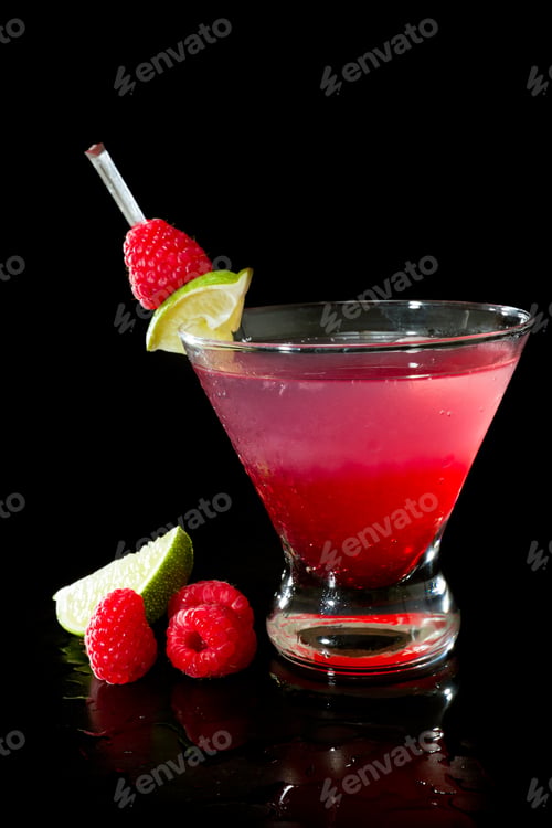 Preview: Raspberry Cocktail Isolated On A Black Background Garnished With A Lime And Afresh Raspberry