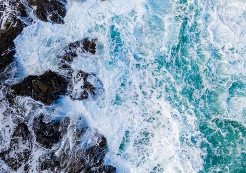 Preview: Drone Aerial View Of Waves Crashing Over Rocks On Lumaha'I Beach On North Shore Of Kauai