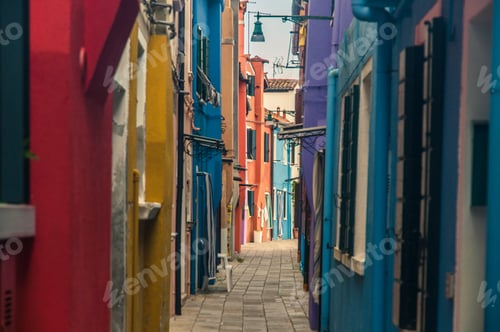 Preview: Landscape Photo Of A Narrow Alley In A Colorful Neighborhood With Tiny Houses (Blue, Red, Yellow