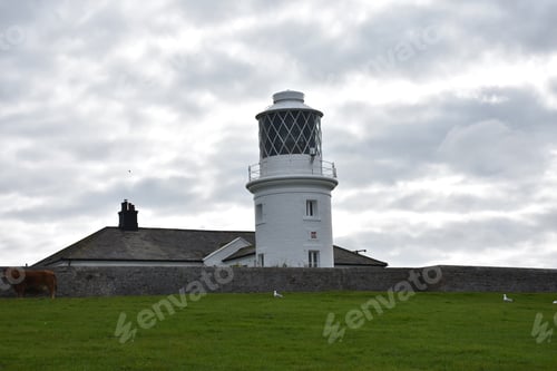 Preview: St Bees Lighthouse On A Cloudy Day In England.
