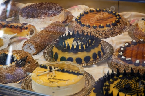 Preview: Bakery Window Full Of Mouth Watering Sweets, Picture Taken Through Glass.