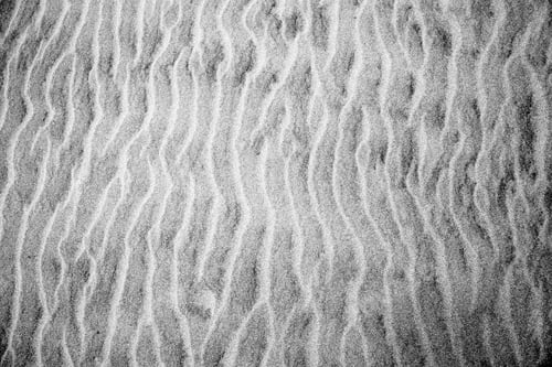 Preview: Image Of Sand In Beach. Texture In The Ground Caused By Water And Wind.