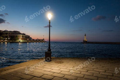 Preview: View Of Illuminated Street Light, Seascape, Lighthouse And Chania Town, Crete, Greece