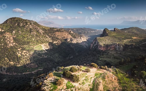 Preview: Green Agricultural Landscape On Mountains With Mountain Peaks At Crete Island