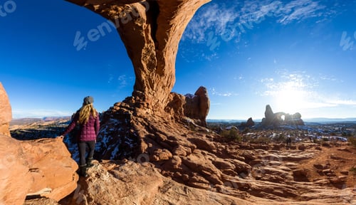 Preview: Woman Standing At The Base Of North Window Enjoying The Panoramic View