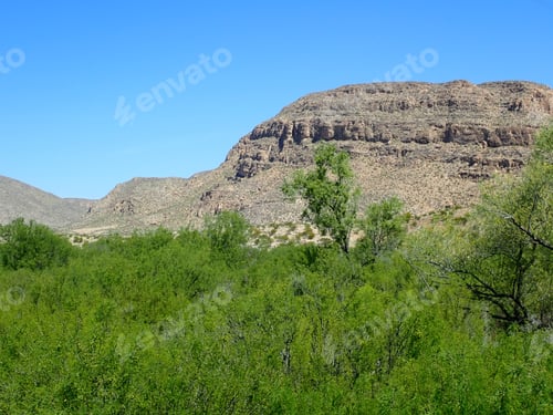 Preview: Desert Mountain Against A Blue Sky