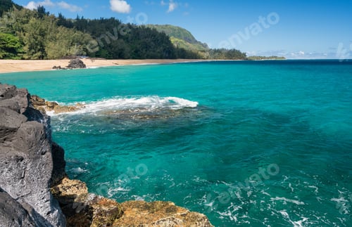 Preview: Rocks Frame The Turquoise Ocean Off Lumahai Beach In Kauai In Hawaiian Islands